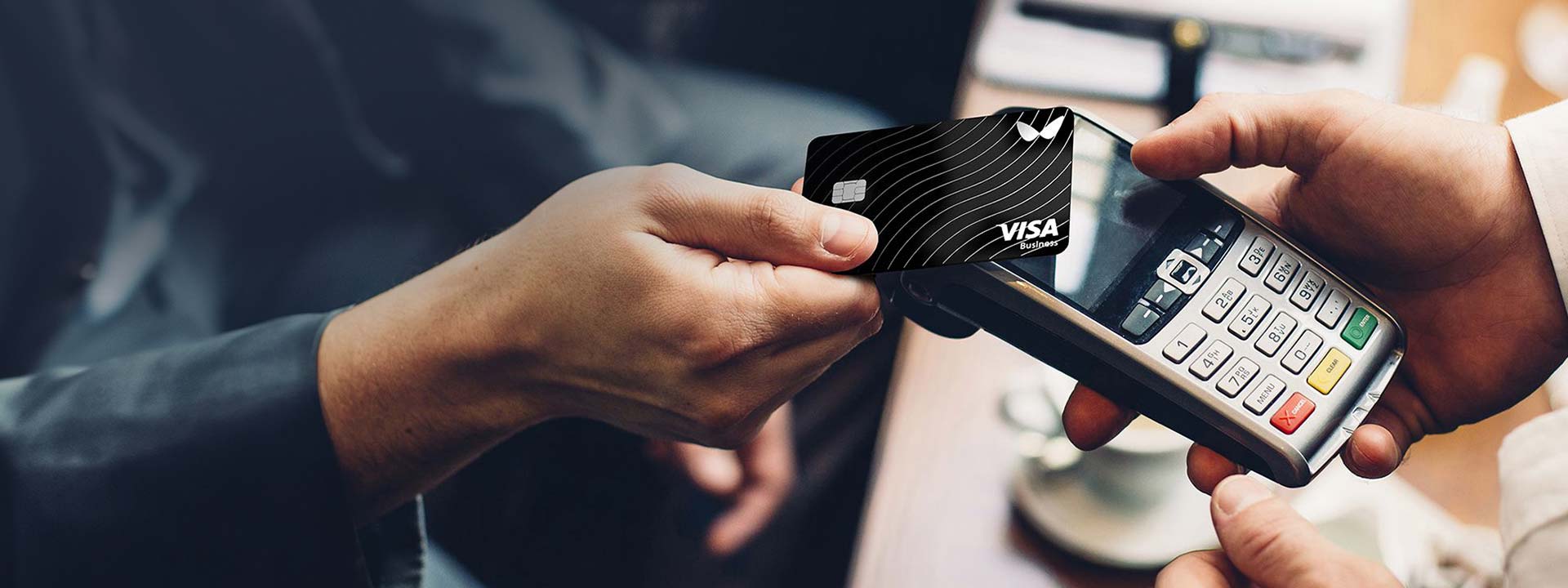 visa business card paying contactless on card machine